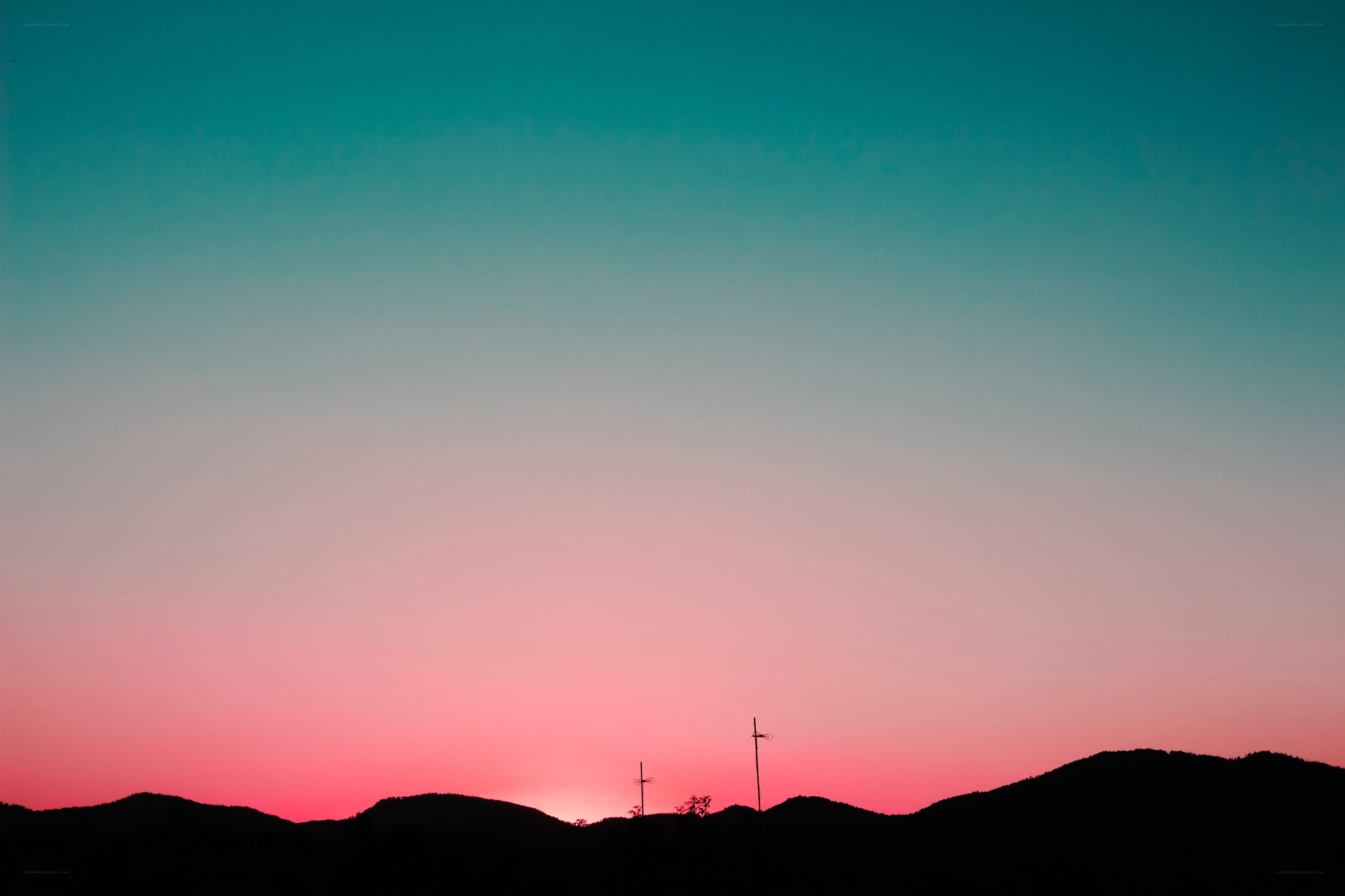 Silhouetted hills at sunset