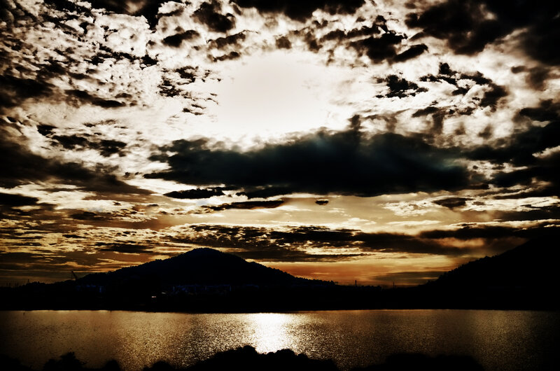 Silhouetted Hills over Water