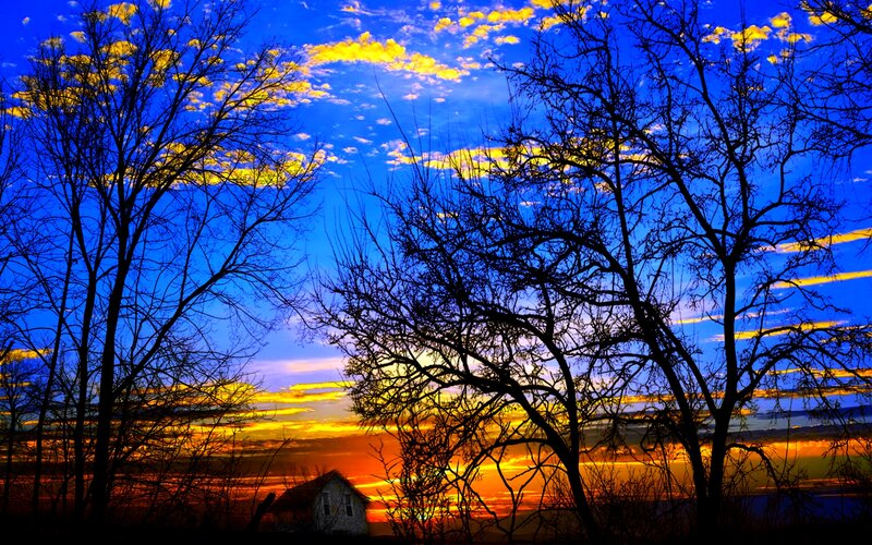 Silhouetted House at Sunset — Blue