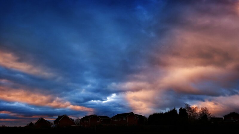 Silhouetted Houses at Dusk — Blue, Dramatic, Sunset