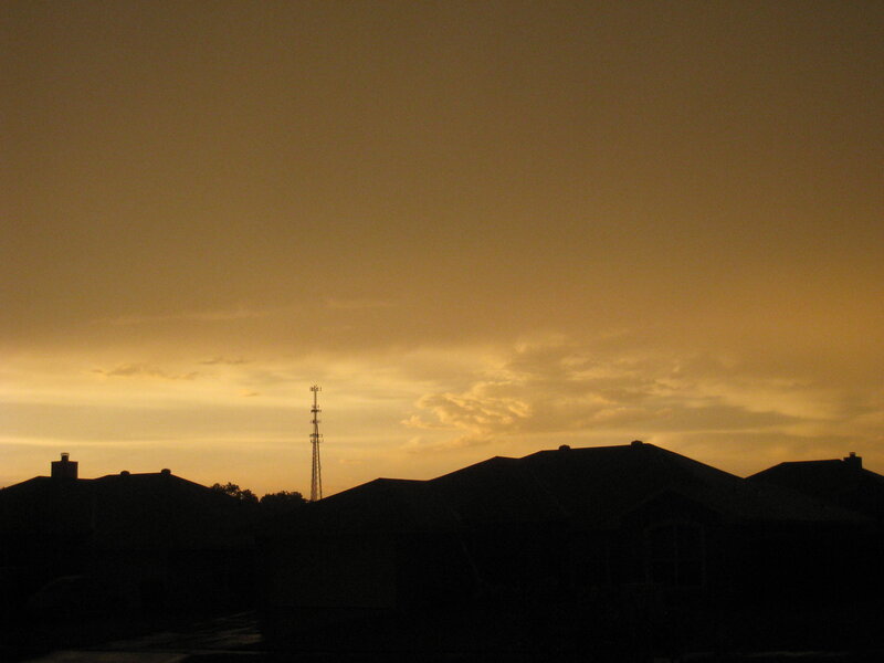 Silhouetted Houses at Dusk — Orange