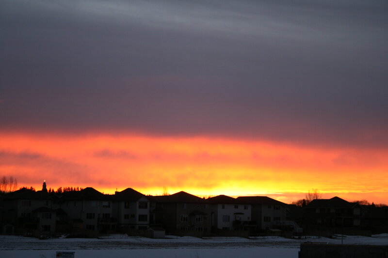 Silhouetted Houses at Sunset — Orange, Dramatic, Photograph, Snow
