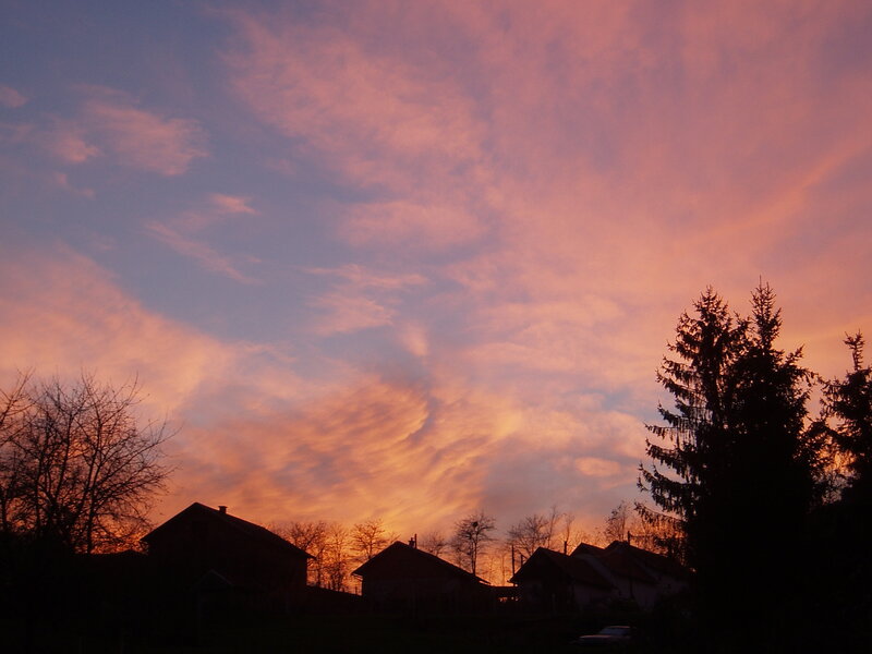 Silhouetted Houses at Sunset — Orange