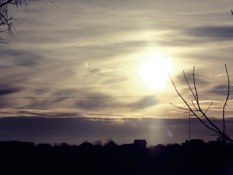 Silhouetted Houses at Sunset