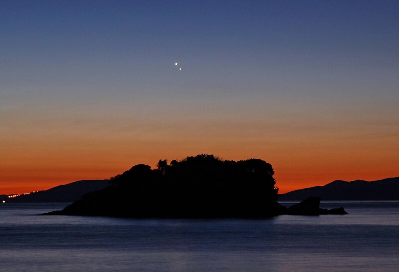 Silhouetted Island at Dusk — Orange