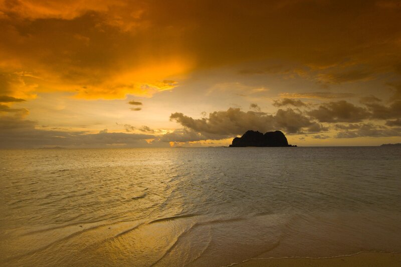 Silhouetted Island at Sunset — Orange, Dramatic, Photograph, Ocean, Sky