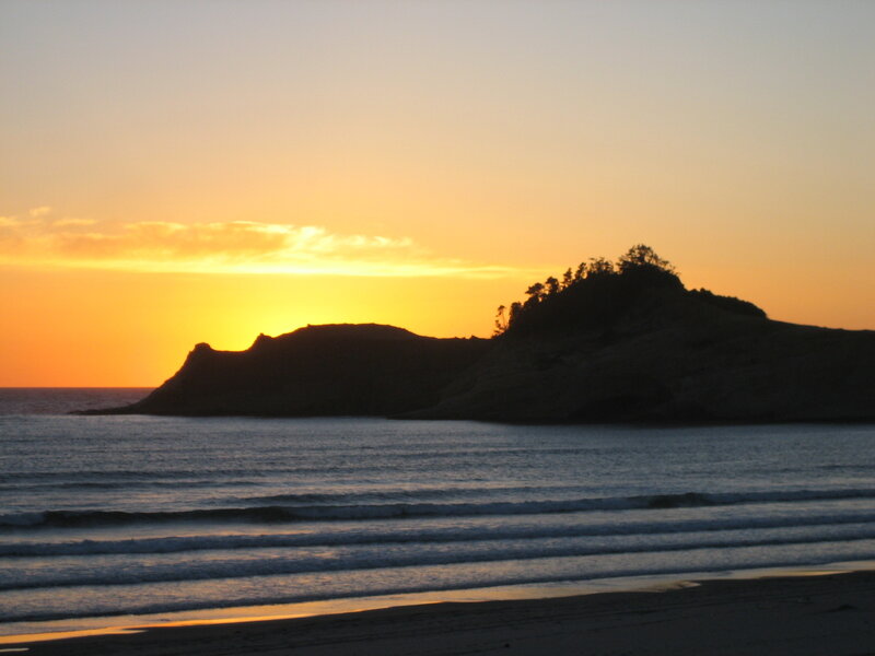 Silhouetted Island at Sunset — Orange, Serene, Photograph, Ocean