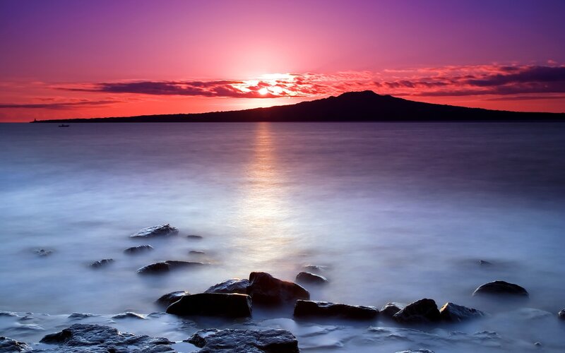 Silhouetted Island at Sunset — Purple, Serene, Photograph, Sea