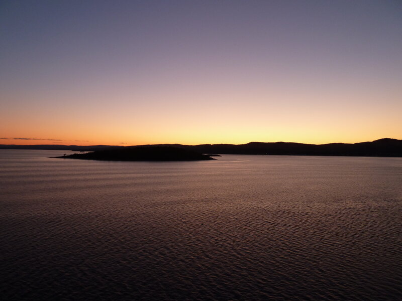 Silhouetted Island at Sunset — Purple