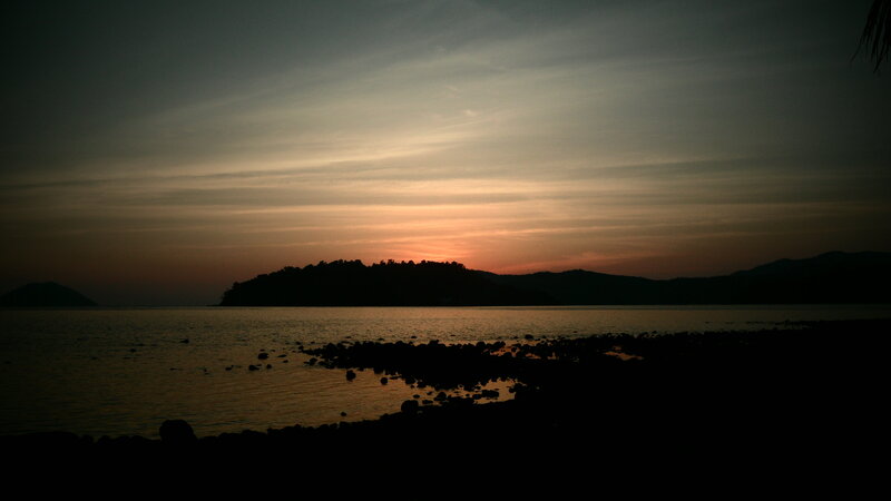 Silhouetted Island at Sunset