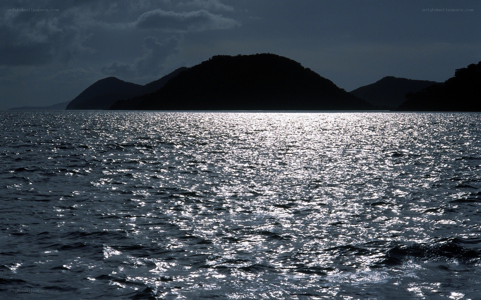silhouetted islands at dusk