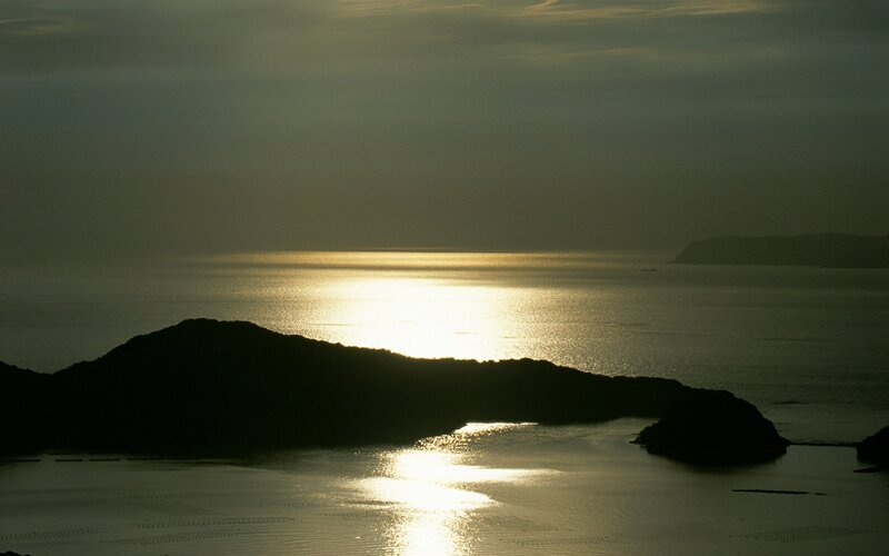 Silhouetted Islands at Sunset — Black