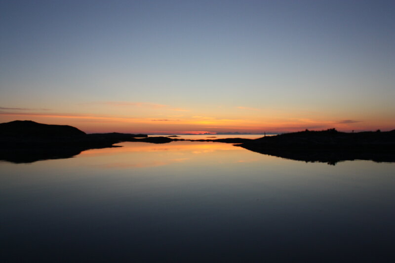 Silhouetted Islands at Sunset — Blue