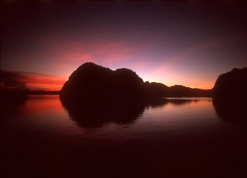 Silhouetted Islands at Sunset — Red