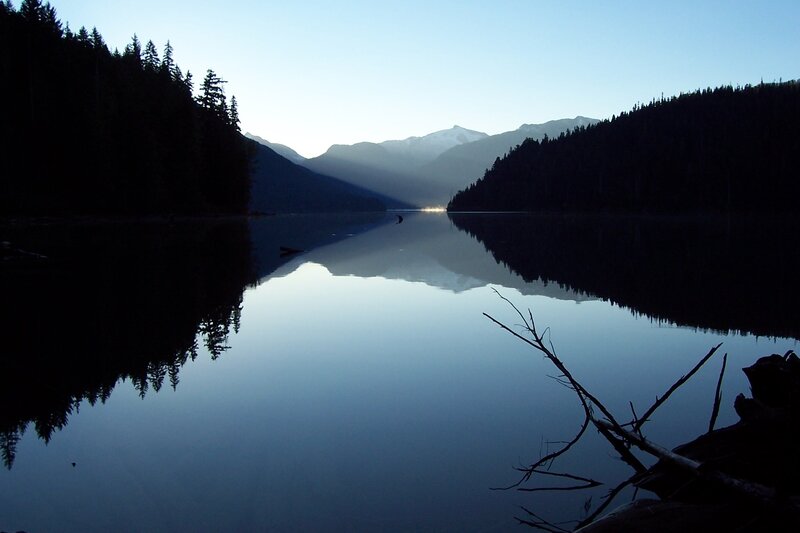 Silhouetted Lake and Mountains