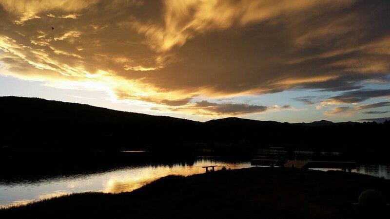 Silhouetted Lake at Sunset