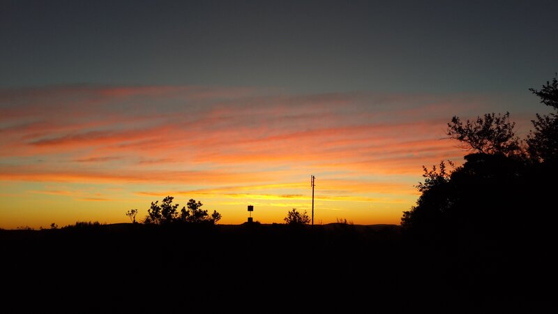 Silhouetted Landscape at Sunset — Orange