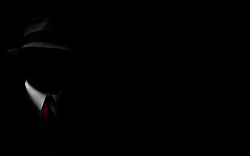 Silhouetted Man in Hat