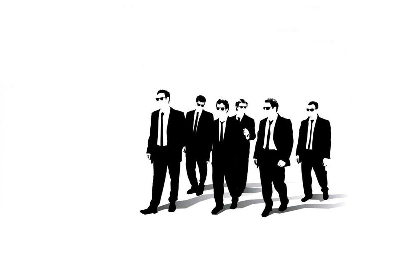 silhouetted men in suits