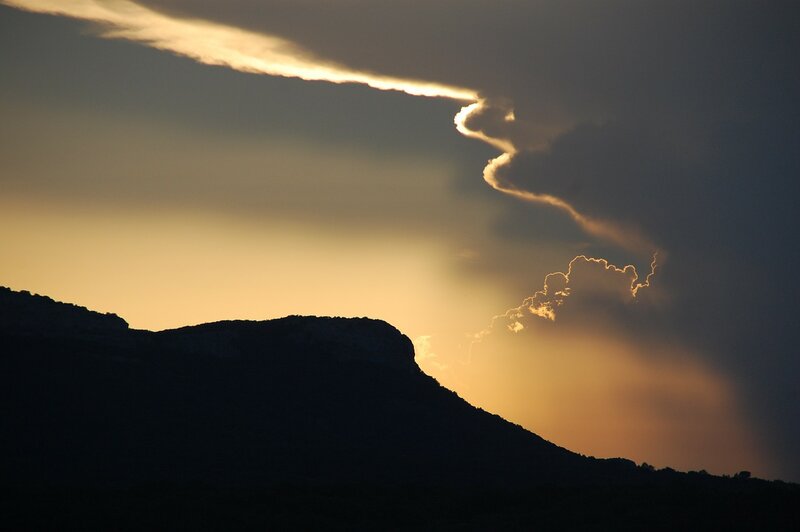 Silhouetted Mountain at Sunset — Black
