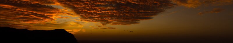 Silhouetted Mountain at Sunset — Orange, Dramatic