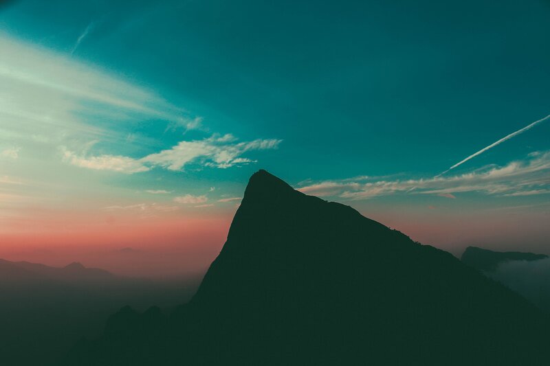 Silhouetted Mountain Peak — Teal