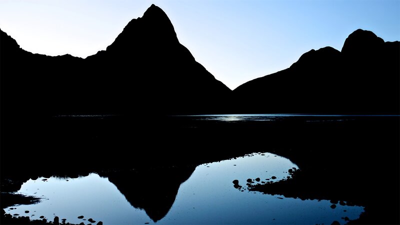 Silhouetted mountains at dawn