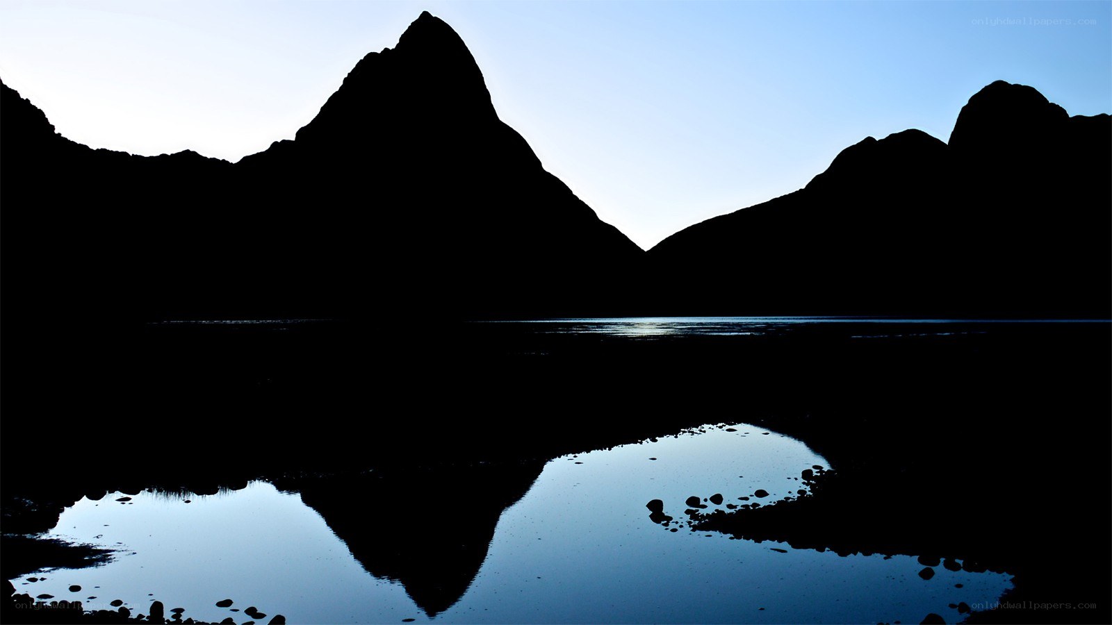 Silhouetted mountains at dawn