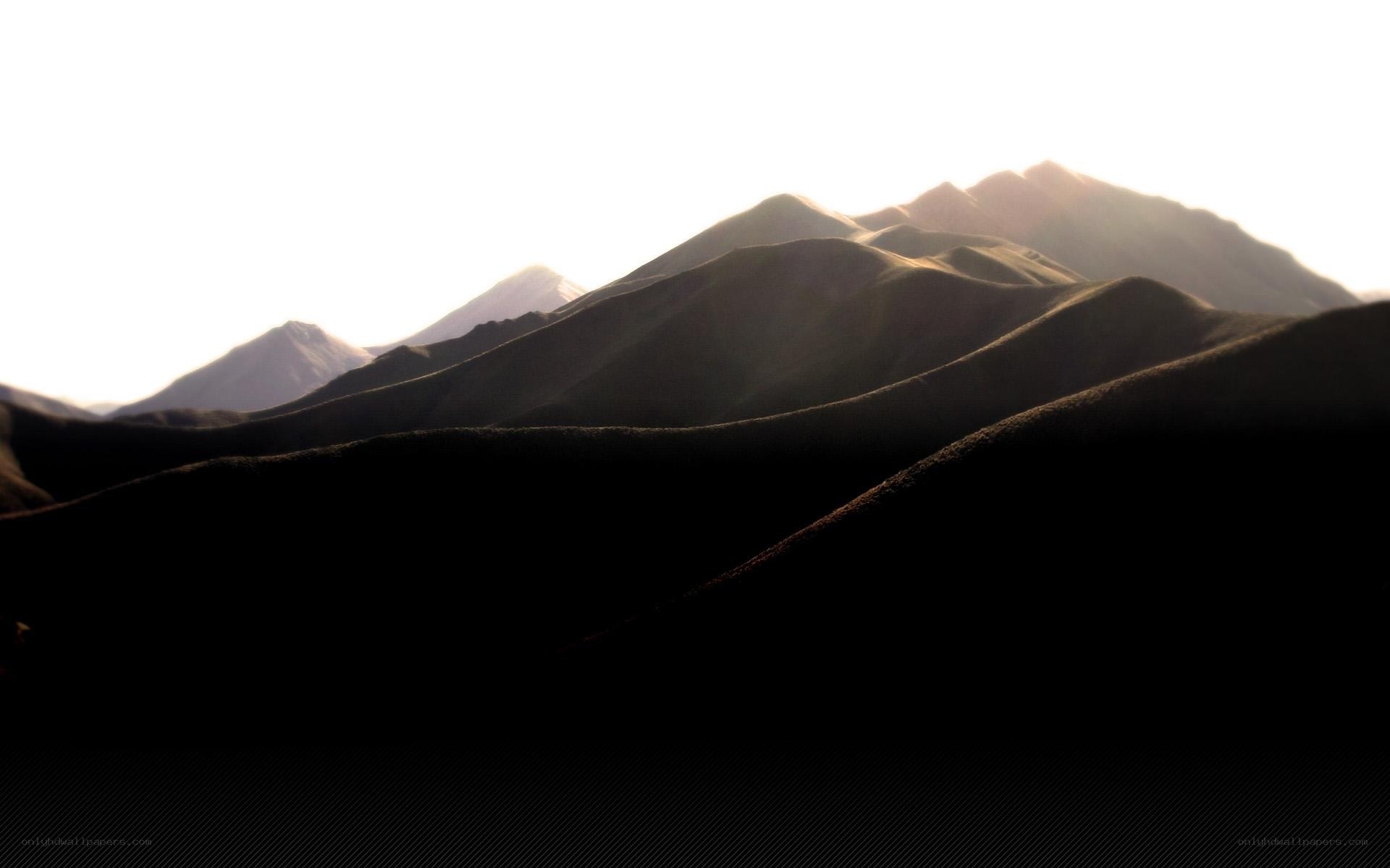 Silhouetted mountains at dawn