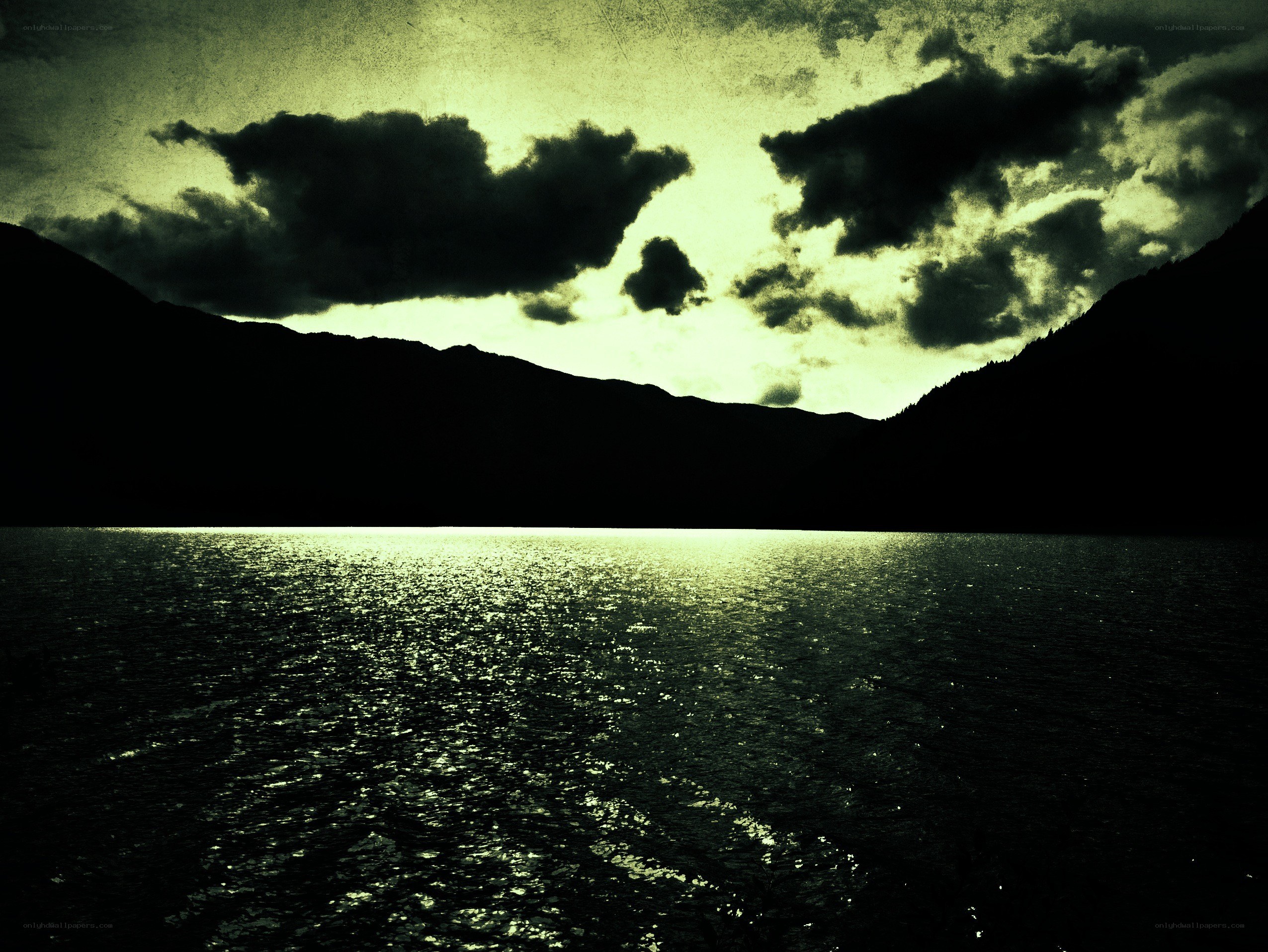 silhouetted mountains at dusk