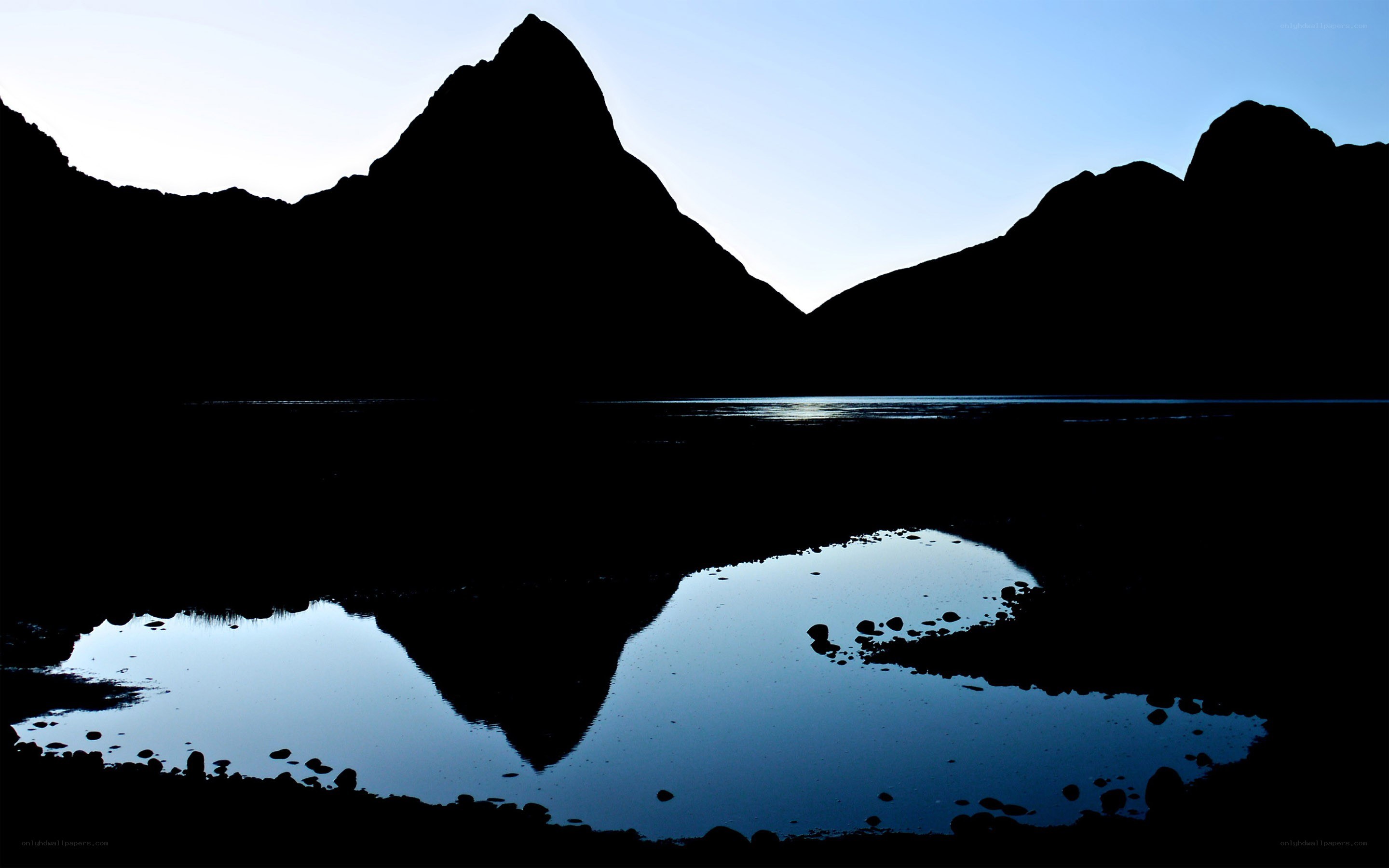 Silhouetted mountains at dusk