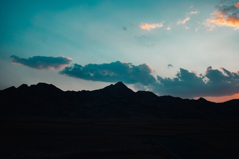 Silhouetted Mountains at Dusk — Blue, Dramatic, Sunset