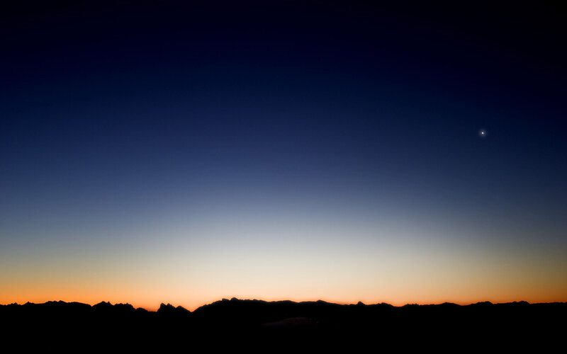 Silhouetted Mountains at Dusk — Blue, Serene, Sunset, Photograph, Sky, Star, Orange