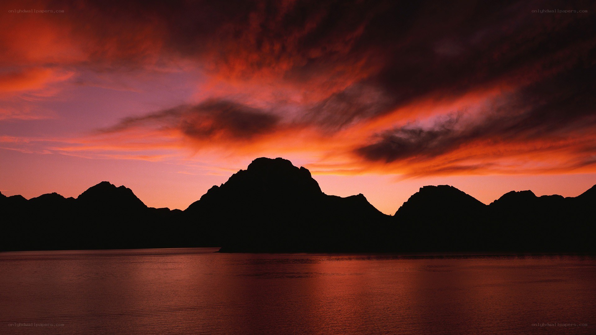 Silhouetted mountains at sunset
