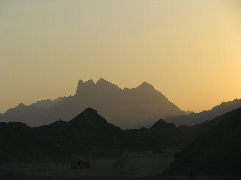 Silhouetted mountains at sunset