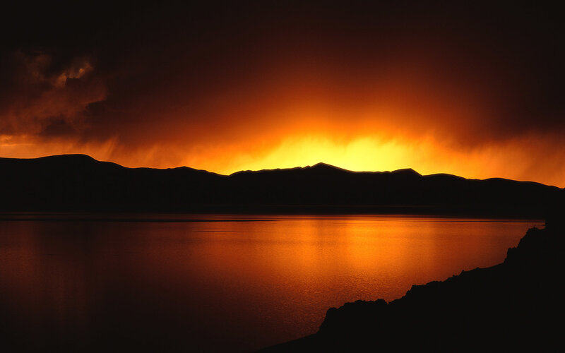 Silhouetted Mountains at Sunset — Orange, Dramatic, Photograph, Lake, Sky, Black
