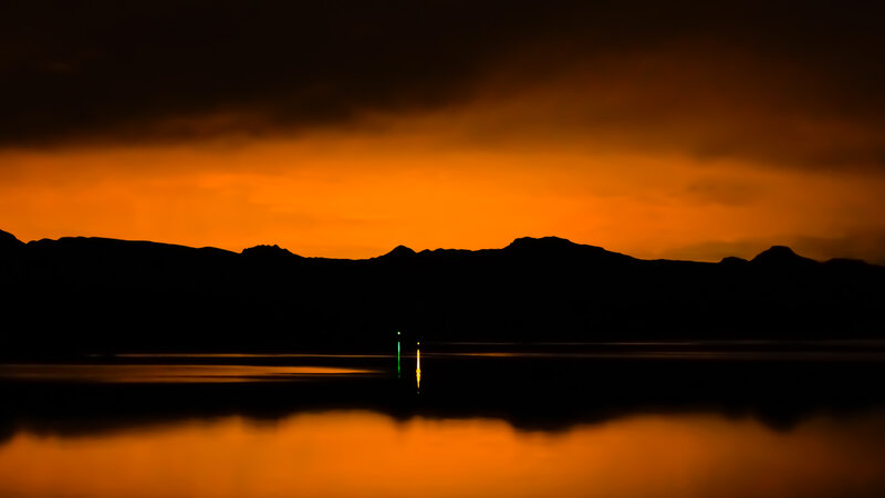 Silhouetted Mountains at Sunset — Orange, Dramatic, Photograph, Water, Sky