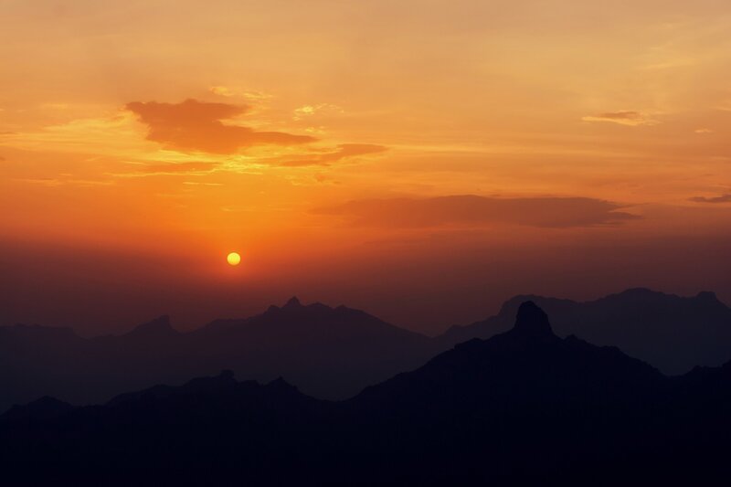 Silhouetted Mountains at Sunset — Orange, Serene, Photograph, Sun