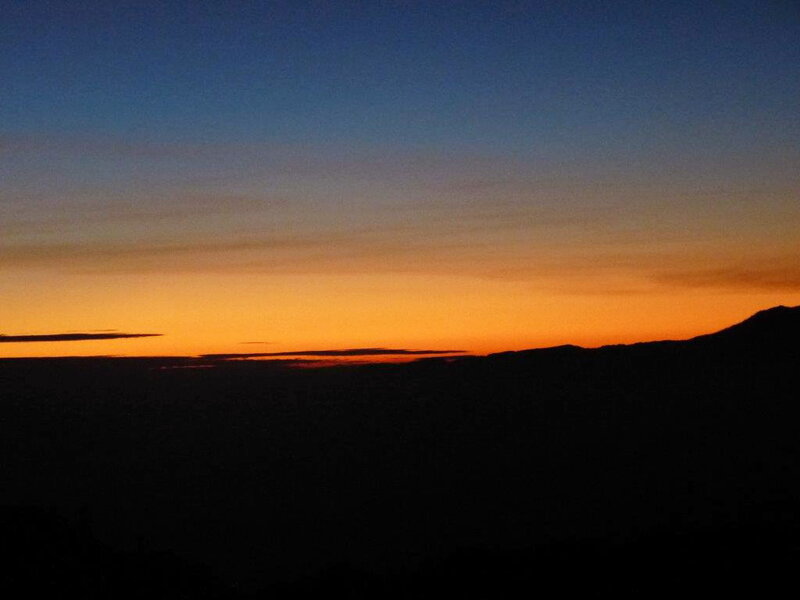 Silhouetted Mountains at Sunset — Orange, Serene