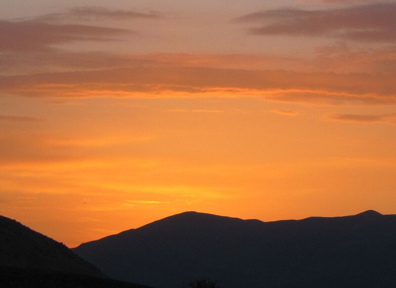 Silhouetted Mountains — Orange, Serene