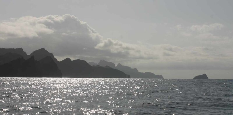Silhouetted Mountains over Sea