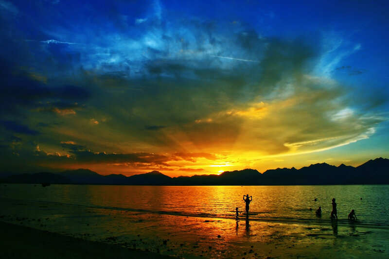 Silhouetted People at Beach — Blue, Dramatic