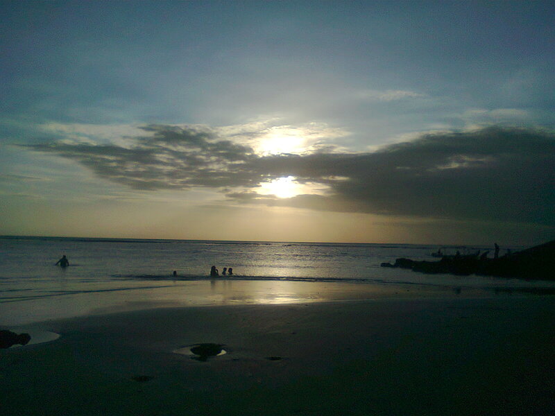Silhouetted People at Beach — Blue