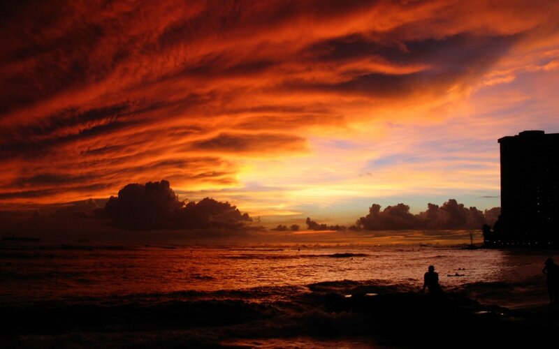 Silhouetted People at Beach — Orange, Dramatic