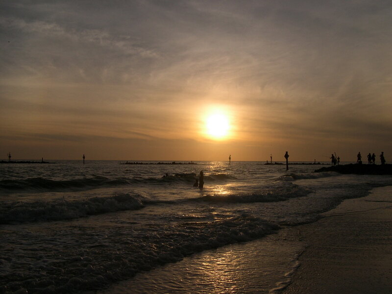 Silhouetted People at Beach — Yellow