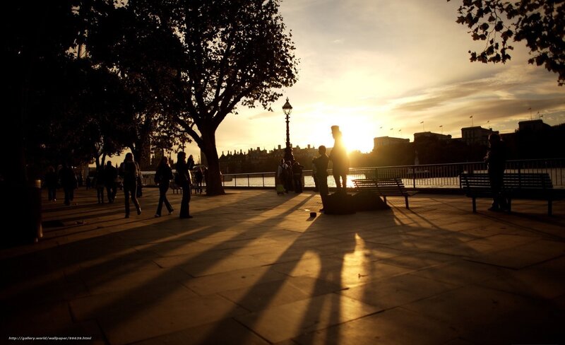 Silhouetted People at Sunset — Gold