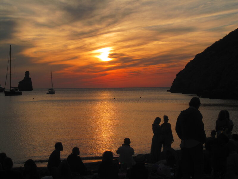 Silhouetted People at Sunset — Orange, Serene, Photograph, Boats