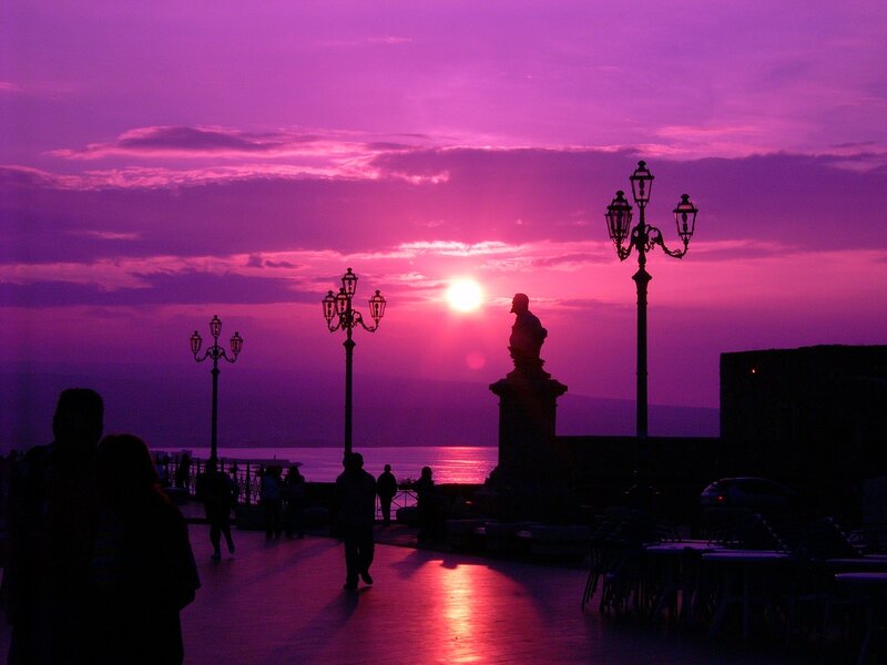 Silhouetted People at Sunset — Purple