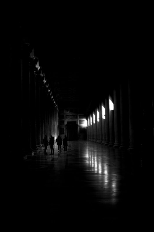 Silhouetted People in Hallway