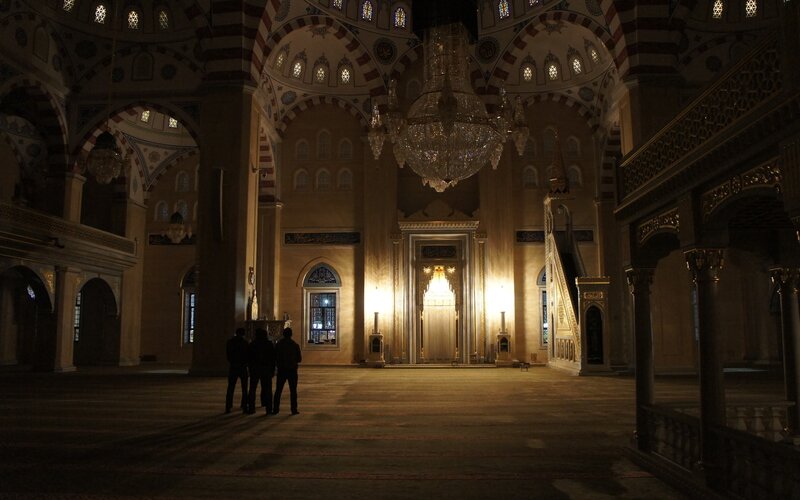 Silhouetted People in Mosque